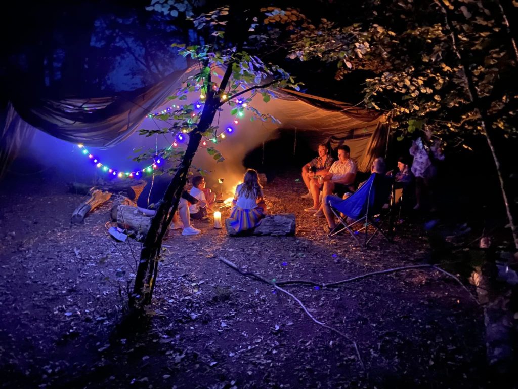 Camping in the woods under the trees